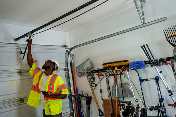 Professional Garage Door Panel Replacement technician working in Paris, MO